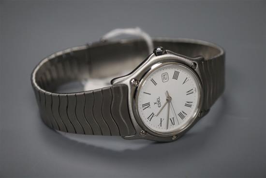 A stainless steel Ebel quartz mid size wrist watch, no box or paperwork, case diameter 33mm excluding winding crown.